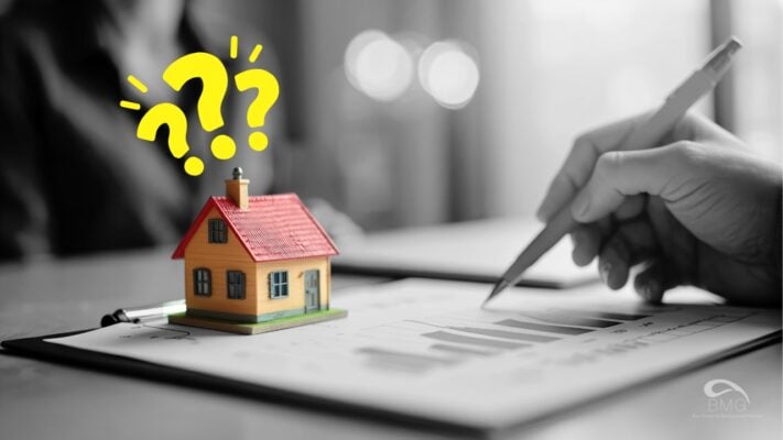 Small house model on paperwork with a person reviewing charts, with question marks symbolizing confusion