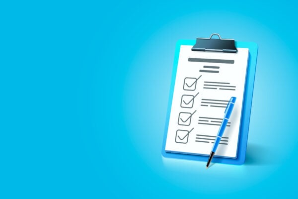 clipboard with a checklist and pen