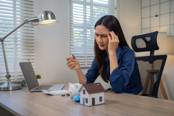 Landlord reviewing rental pricing decisions during a slower market